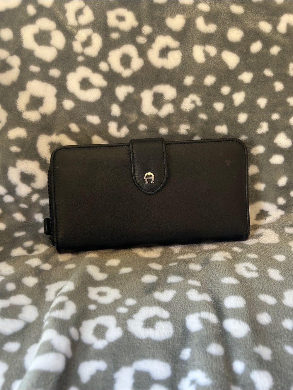 Black Leather Zip-Around Wallet with Snap Closure